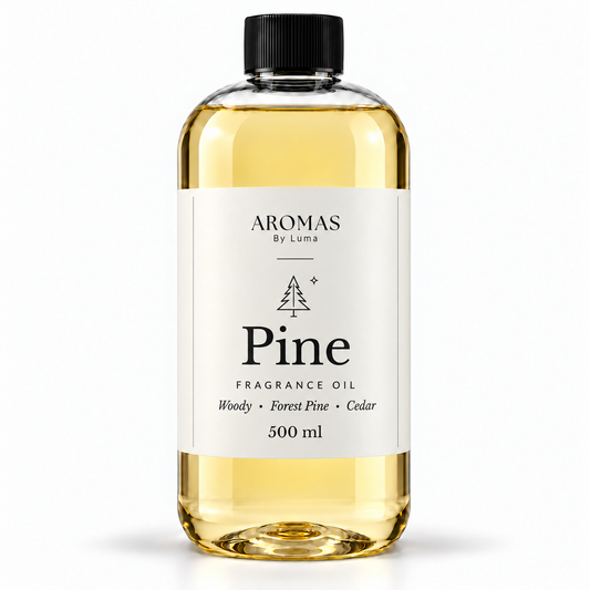 Pine 500 mL fragrance oil by Aromas By Luma with Woody, Forest Pine and Cedar notes, shown on a white background.